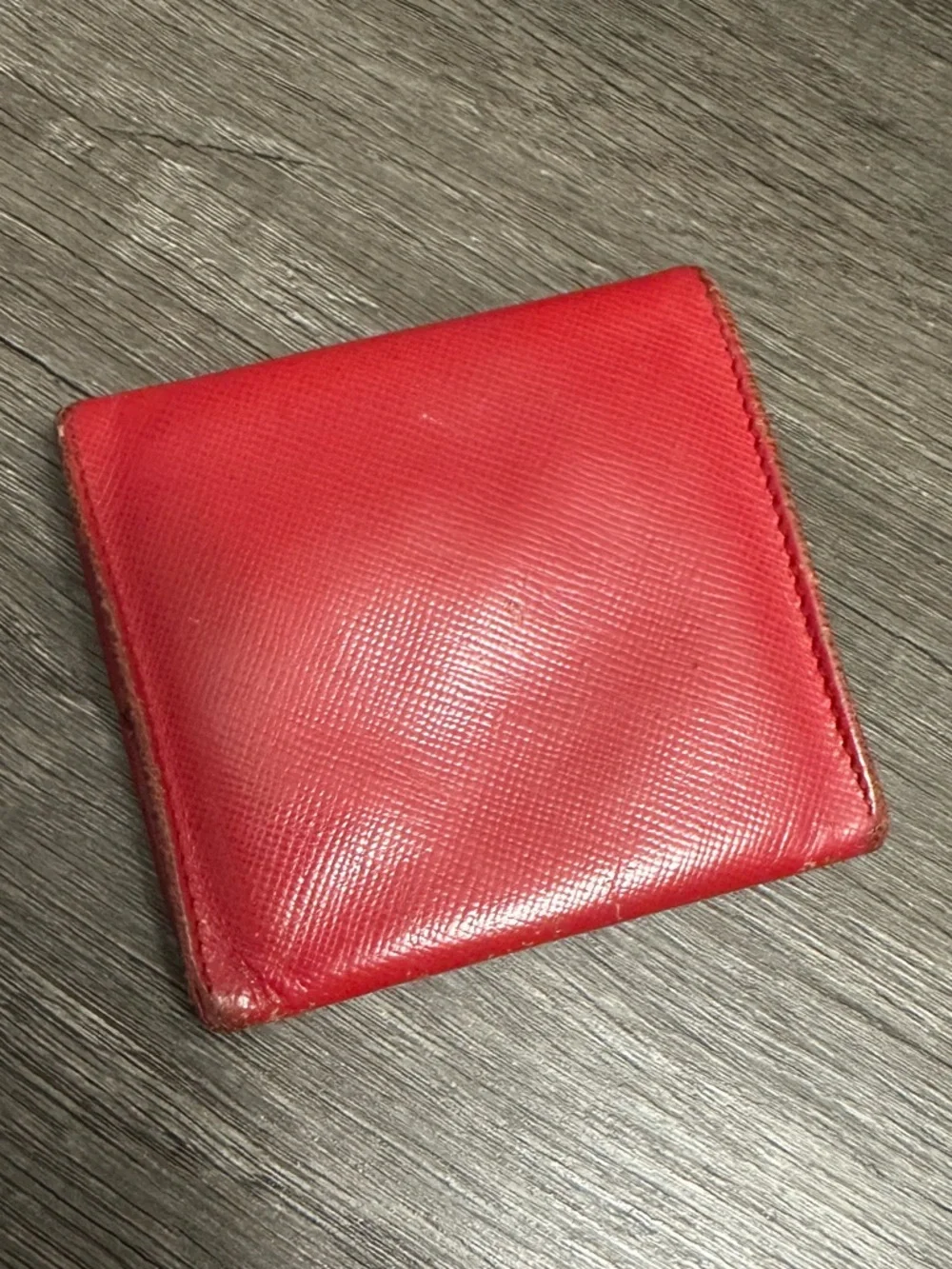 Prada red Saffiano leather wallet/coin pouch.